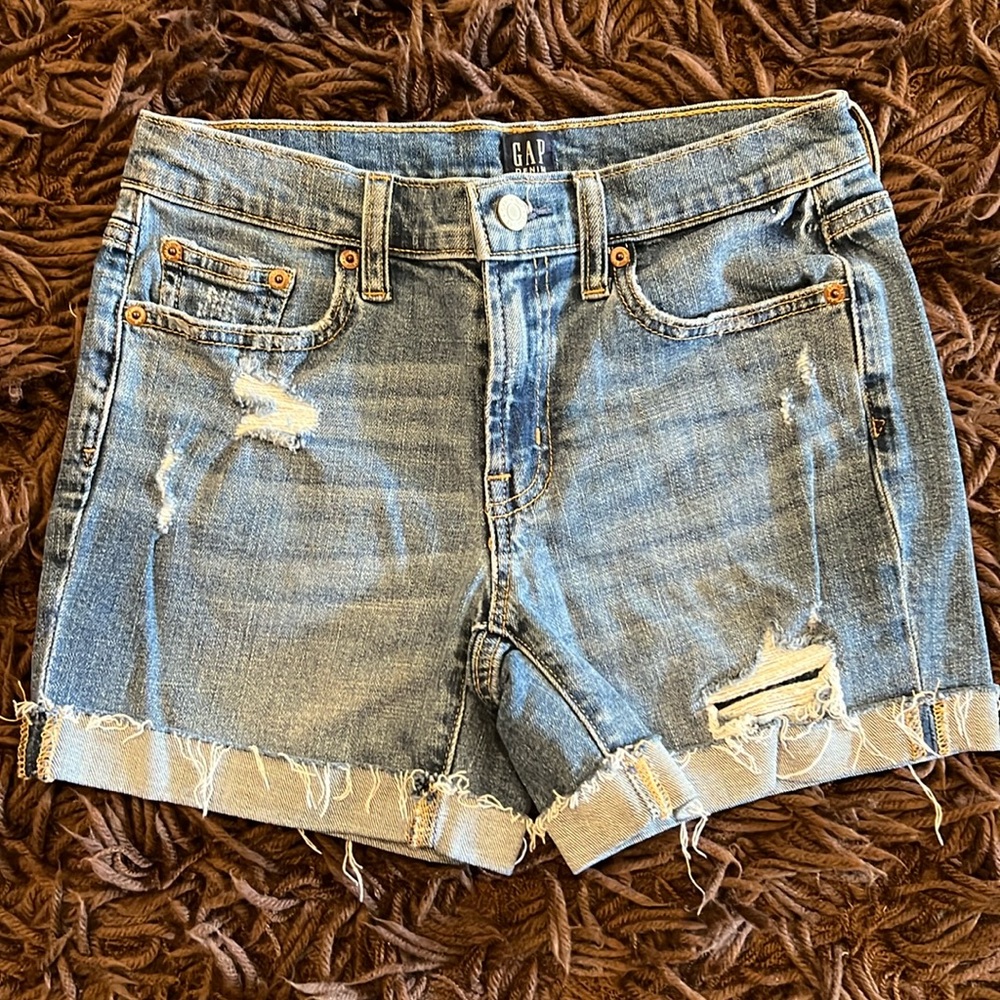 Gap denim jean shorts distressed size 00/24 5” length. Excellent condition.